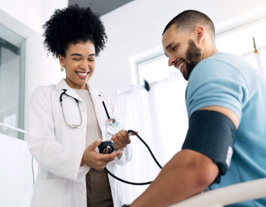 Nursing student practicing blood pressure assessment during clinical skills training
